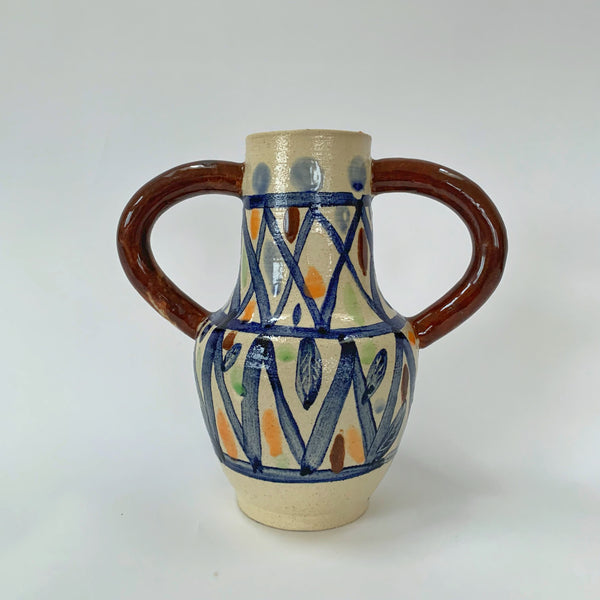 white and cobalt amd brown handles stoneware vase