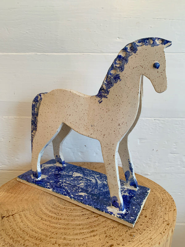 Cobalt and white speckled Horse