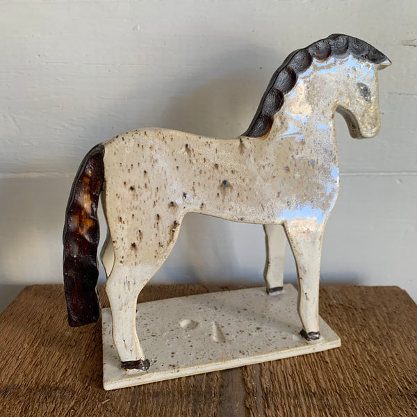Speckled Brown and White horse