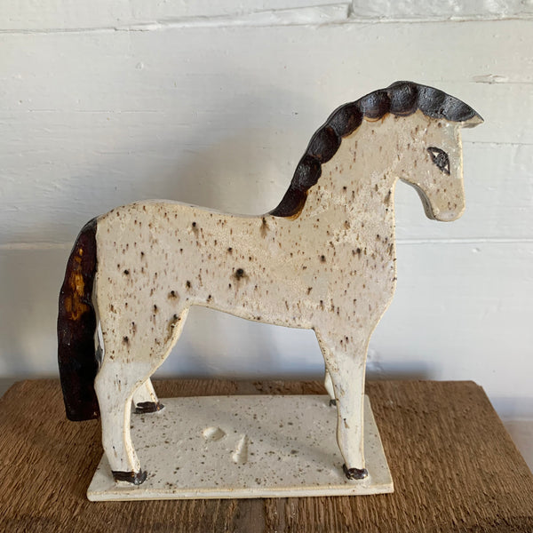 Speckled Brown and White horse