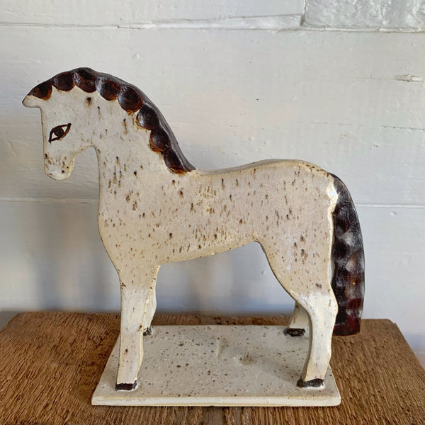 Speckled Brown and White horse